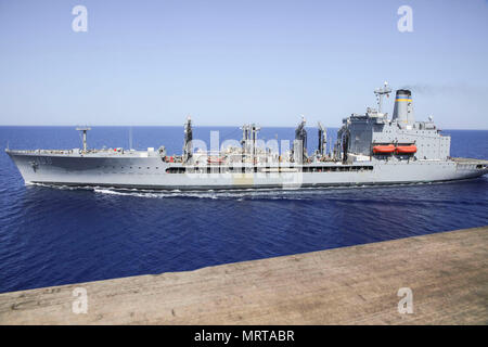 170629-N-FM530-125  MEDITERRANEAN SEA (June 29, 2017) Fleet replenishment oiler USNS Big Horn (T-AO 198) sails next to the San Antonio-class amphibious transport dock ship USS Mesa Verde (LPD 19) after a replenishment-at-sea June 29, 2017. The ship is deployed with the Bataan Amphibious Ready Group and 24th Marine Expeditionary Unit to support maritime security operations and theater security cooperation efforts in the U.S. 6th Fleet and U.S. 5th Fleet areas of operations. (U.S. Navy photo by Mass Communication Specialist 2nd Class Brent Pyfrom/Released) Stock Photo