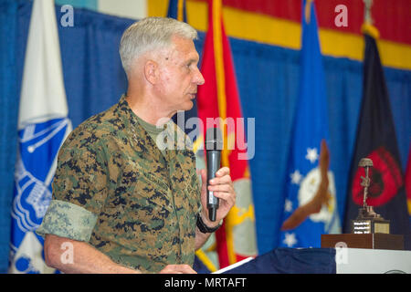 U.S. Marine Corps Gen. Thomas D. Waldhauser, commander of U.S. Africa Command, speaks during a change of command ceremony for Special Operations Command Africa at Kelley Barracks, Stuttgart, Germany, June 29, 2017. Special Operations Command Africa supports U.S. Africa Command by counter violent extremist organizations, building the military capacity of key partners in Africa and protecting U.S. personnel and facilities. (U.S. Army photo by Visual Information Specialist Eric Steen) Stock Photo