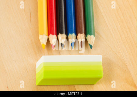 many sharp sharpened colored pencils close-up on the background Stock Photo
