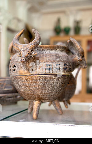 Ancient persian vintage bronze, brass bowl with cow ornamente, Iran Stock Photo