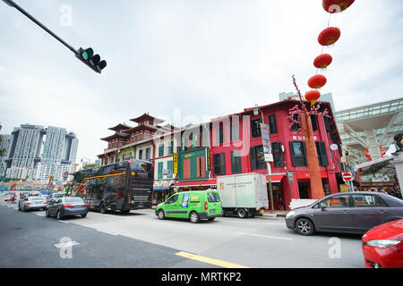 CHINATOWN, SINGAPORE - JAN 20: Chinatown street traffic in Chinatown district, Singapore. Chinese New Year celebrations in 2017. Stock Photo