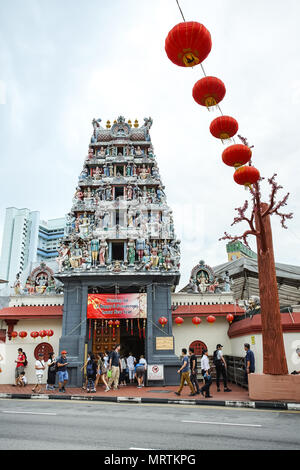 PAGODA STREET, SINGAPORE - JAN 20, 2017: Pagoda on the gate of Sri Mariamman Temple, this Hindu temple is neary the Chinese temple - Buddha Tooth Reli Stock Photo