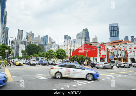 CHINATOWN, SINGAPORE - JAN 20, 2017: Singapore Chinatown district traffic in front of China Square on cloudy day. Stock Photo