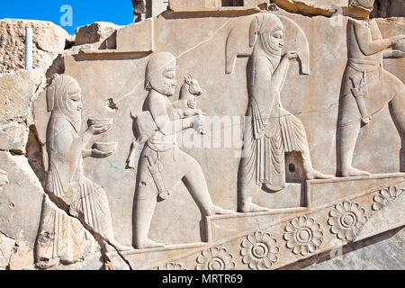 Bass relief decoration in central part of Persepolis complex, next to Palace of 100 columns , Iran Stock Photo