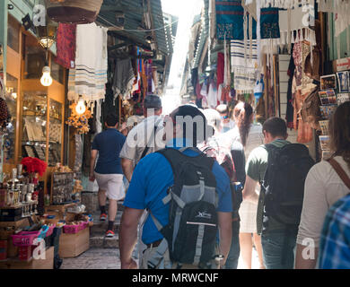 170703-N-FE442-085 JERUSALEM (July 3, 2017) Fitness Boss Justin Vigil from the aircraft carrier USS George H.W. Bush (CVN 77) walks through the streets of Old City Jerusalem. The ship is in Haifa, Israel for a scheduled port visit to enhance U.S.-Israel relations. (U.S. Navy photo by Mass Communication Specialist 3rd Class Matt Matlage/Released) Stock Photo