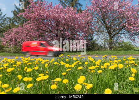 Speeding Royal Mail van in summer countryside Stock Photo