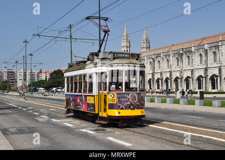 Tram on route 15 to Praca da Figueira passes the Monastery at Belem, Lisbon, Portugal Stock Photo