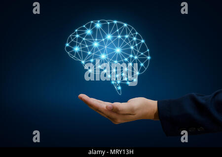 AI Hand Businesspeople press the phone. Brain Graphic Binary Blue Technology Stock Photo