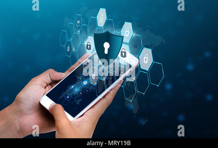 Unlocked smartphone lock Internet phone hand Businesspeople press the phone to communicate in the Internet. Cyber security concept hand protection net Stock Photo