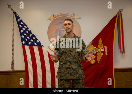 U.S. Marines, family and friends gather for Maj. Gen. Robert F. Castellvi's promotion ceremony on Camp Lejeune, N.C., 11 July, 2017. Castellvi was promoted from Brigadier General to Major General by Maj. Gen. Walter L. Miller. (U.S. Marine Corps photo by Lance Cpl. Taylor N. Cooper) Stock Photo