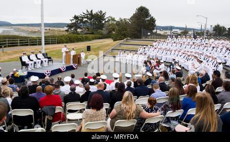 Naval Ocean Processing Facility Whidbey Island is a U.S. Navy command tasked with processing acoustic and undersea data for maritime operations. On 13 July 2017 personnel and guests gathered in Oak Harbor, Washington, for a change of command and retirement ceremony at the facility. The archival image records attendance and formal proceedings during the leadership transition event. Stock Photo