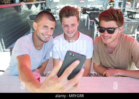 a group of young good looking friends doing a selfie Stock Photo