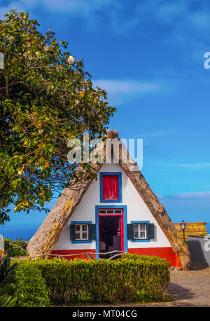 Traditional house of Santana village in vertical, Camache de Freitas - Madeira island of Portugal Stock Photo