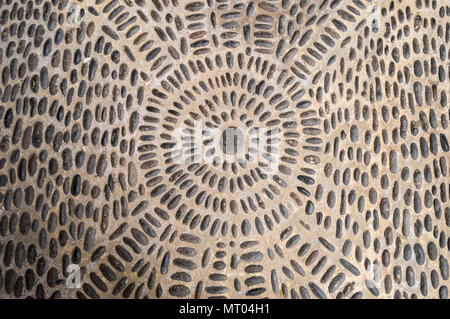 Small pebble background formed of several circles and several straight Stock Photo
