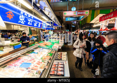 Indoor Omicho Ichiba, Omicho Market, est mid 18th century, largest fresh food market in Kanazawa, Japan. View along stall selling pre-packed fish. Stock Photo