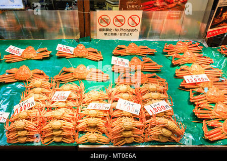 Indoor Omicho Ichiba, Omicho Market, est mid 18th century, largest fresh food market in Kanazawa, Japan. Crabs on tables at fresh fish store. Stock Photo