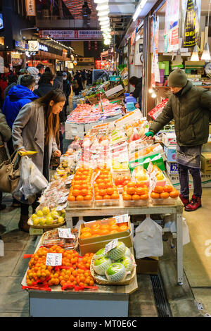 Indoor Omicho Ichiba, Omicho Market, est mid 18th century, largest fresh food market in Kanazawa, Japan. View along fresh fruit stall. Stock Photo