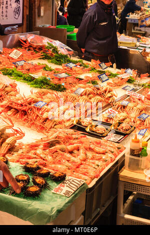 Indoor Omicho Ichiba, Omicho Market, est mid 18th century, largest fresh food market in Kanazawa, Japan. Crabs on tables at fresh fish store. Stock Photo