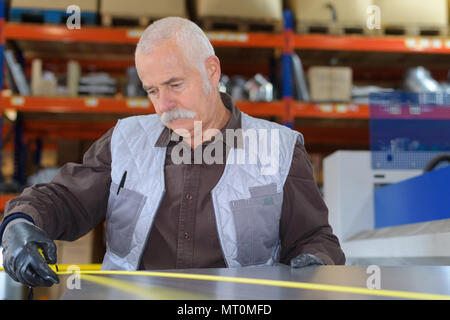 sebiiro operator works at machine Stock Photo