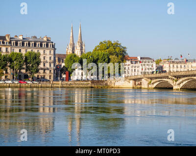 Adour River and the spires of the Cathedral of Saint Mary - Bayonne, France Stock Photo