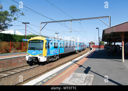 Melbourne, Australia: April 03, 2018: A train arrives in Brighton Beach railway station which is located on the Sandringham line in Victoria state. Stock Photo