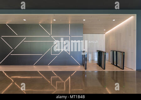 Santa Clara, California - April 26, 2018:  AMD signage at its headquarters in Silicon Valley. AMD is an American semiconductor company that develops c Stock Photo