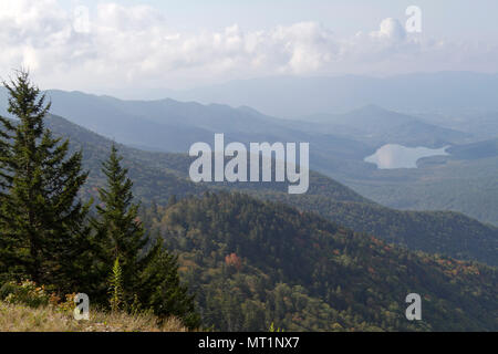 Scenic view from the highest peak of the Appalachian Mountains in Mount Mitchell State Park, North Carolina, showing a vast expanse of mountains, fore Stock Photo