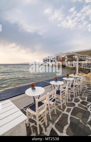 MYKONOS, GREECE - MAY 2018: Sunset view from the embarkment cafe of Little Venice district in Mykonos Chora town, Greece Stock Photo