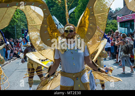 Luton, UK. 27th May, 2018. Lutonâ€™s vibrant 42nd International Carnival encircles Wardown Park. Thousands watched the colourful procession pass. Credit: Stephen Bell/Alamy Live News. Stock Photo