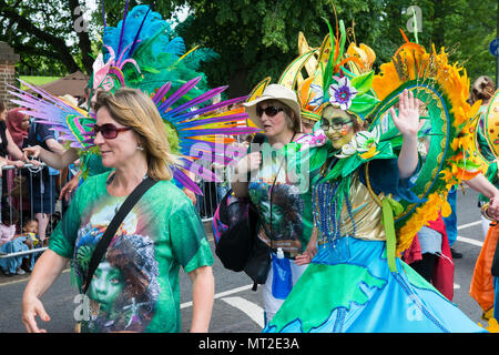 Luton, UK. 27th May, 2018. Lutonâ€™s vibrant 42nd International Carnival encircles Wardown Park. Thousands watched the colourful procession pass. Credit: Stephen Bell/Alamy Live News. Stock Photo