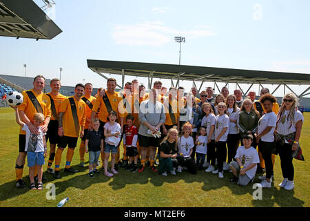 Manchester, UK. 28th May 2018. Winners of the All Star Football match,  the emergency services team, which includes police officers, fire and ambulance crews who have played in aid of the 'We Love Manchester Emergency Fund', Manchester City Academy, Manchester, 27th May, 2018 (C)Barbara Cook/Alamy Live News Stock Photo