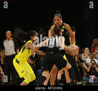 Las Vegas, Nevada, USA. 27th May, 2018. A'ja Wilson # 22 of the Las Vegas Aces sets a screen for guard Kelsey Plum # 10 against Jewell Loyd # 24 of the Seattle Storm during the Las Vegas Aces first ever WNBA home game on May 27, 2018 at the Mandalay Bay Events Center in Las Vegas, Nevada. Credit: Marcel Thomas/ZUMA Wire/Alamy Live News Stock Photo