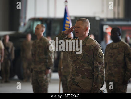 Lt. Col. Elton Sledge, the 455th Expeditionary Mission Support Group deputy commander, renders a salute during the 455th EMSG change of command ceremony at Bagram Airfield, Afghanistan, July 20, 2017. During the ceremony, Col. Bradford Coley relinquished command of the 455th EMSG to Col. Phillip Noltemeyer. (U.S. Air Force photo by Staff Sgt. Benjamin Gonsier) Stock Photo