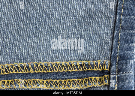 Blue jeans fabric. Denim jeans texture or denim jeans background. Stock Photo