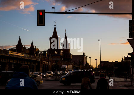 The sun sets over the Oberbaumbruecke in Berlin, Germany. Stock Photo