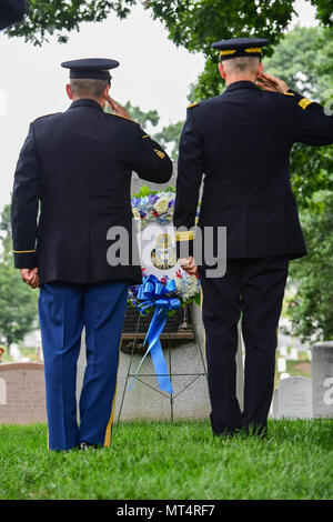 U.S. Army Maj. Gen. Paul K. Hurley, right, the chief of chaplains, and Sgt. Maj. Ralph Martinez, the senior enlisted advisor of the Chaplain Corps, lay a wreath on Chaplains Hill at Arlington National Cemetery, in Arlington, Va., July 28, 2017. The Chaplain Corps celebrated its 242nd birthday.  (U.S. Army photo by Spc. Trevor Wiegel) Stock Photo