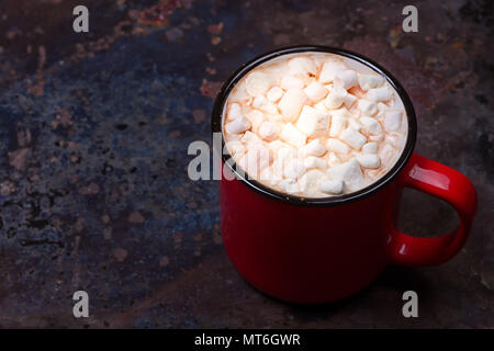 Hot chocolate with marshmallows on grunge dark table Stock Photo - Alamy