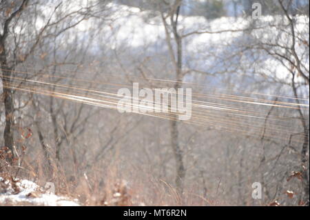 The wire from a TOW missile is seen at firing point 5 on range 19 at Fort McCoy, Wis., on March 14, 2016. The  BGM-71 TOW is a Tube-launched, Optically tracked, Wire-guided  anti-tank missile currently manufactured by Raytheon.  Photo by Jamal Wilson Stock Photo