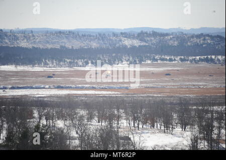 The explosion from a TOW missile is seen from firing point 5 on range 19 at Fort McCoy, Wis., on March 14, 2016. The  BGM-71 TOW is a Tube-launched, Optically tracked, Wire-guided  anti-tank missile currently manufactured by Raytheon.  Photo by Jamal Wilson Stock Photo