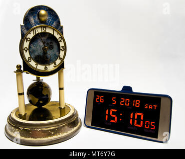 evolution of time measurement from historical clock to modern smartphone. Stock Photo