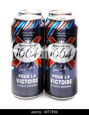 SWINDON, UK - MAY 13, 2018: 4 Cans of Kronenbourg 1664 limited edition Eric Cantona pour la victoire lager on a white background. Stock Photo