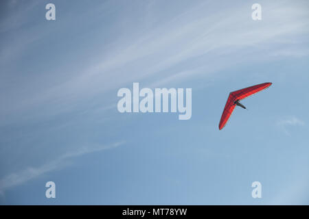 Hang Gliding over the beach Stock Photo