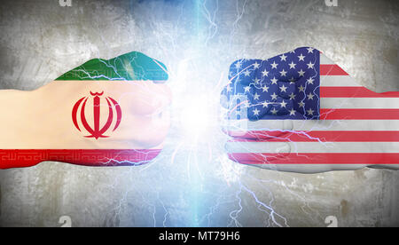 Human fists confrontation. USA vs Iran Stock Photo