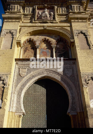 Cordoba, Andalusia, Spain. Great Mosque of Cordoba. Abd al-Rahman I ordered its construction in 784, with subsequent extensions. North facade, along calle Cardenal Herrero. Door of Pardon or Door of Forgiveness, built in the 10th century and modified in 1377 in Mudejar style. Stock Photo