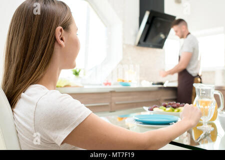 Woman waiting for breakfast from lover Stock Photo