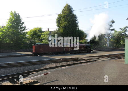 The steam locomotive Hercules arriving at New Romney station: Romney, Hythe & Dymchurch steam railway, Kent Stock Photo