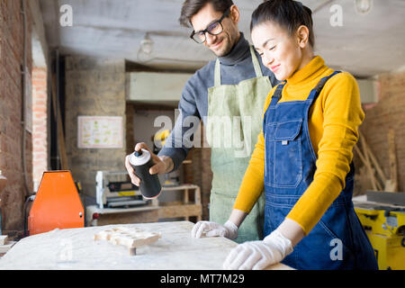 Two artists Doing Creative Woodwork Stock Photo