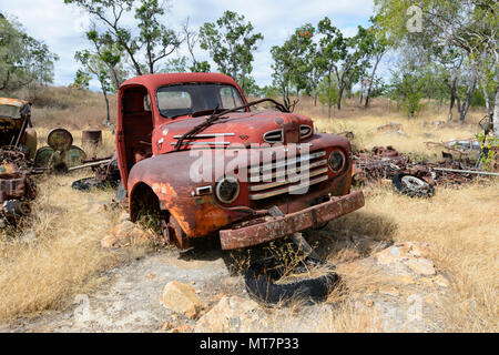Old rusty red Ford truck, part of Tom Prior's historic Ford collection, Chillagoe, Far North Queensland, FNQ, QLD, Australia Stock Photo