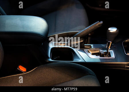 Handbrake and gear shift in modern car interior Stock Photo