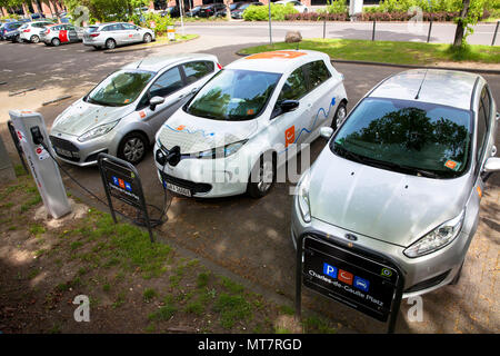 Renault ZOE of the carsharer Cambio at a charging station of the Mobilstation on the Charles-de-Gaulle square in the district Deutz, Cologne, Germany. Stock Photo